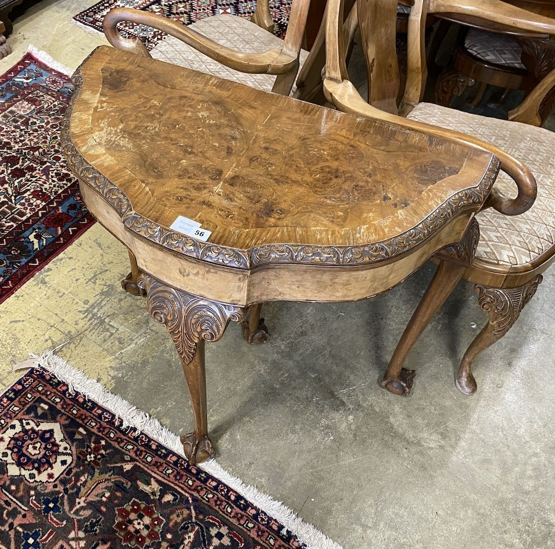 A Queen Anne revival burr walnut D shaped folding card table, width 83cm, depth 43cm, height 77cm